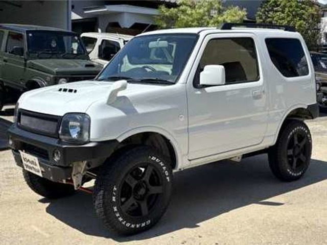 Mazda AZ-Offroad 660 XC 4WD with new tires, lifted up, aftermarket alloy wheels, new Bluetooth-enabled audio