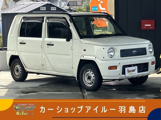 Daihatsu Naked @1. 4WD 5MT with wood-style steering, keyless entry, electric folding mirrors, CD, collision safety body, air conditioning, power steering, power windows