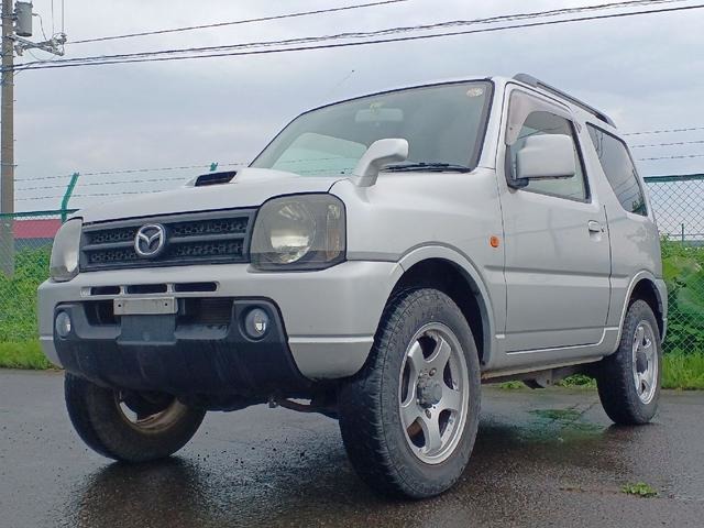 Mazda AZ-Offroad 660 XC 4WD with minimal rust in the mainland, lifted up, aluminum wheels, turbo