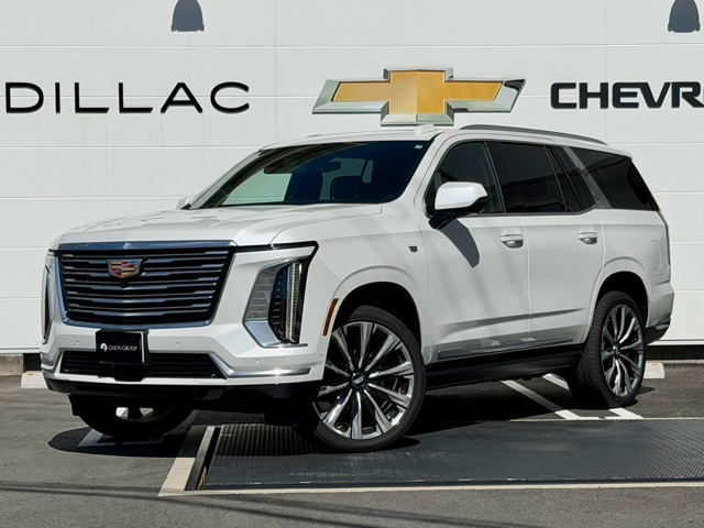 Cadillac Escalade Platinum 4WD certified pre-owned vehicle from a certified dealer, Crystal White Jet Black leather, 55-inch display, automatic doors, AKG 36 speakers, 416ps V8 OHV, electric sunroof, refrigerator, 24-inch alloy wheels, Rear Seat Monitor